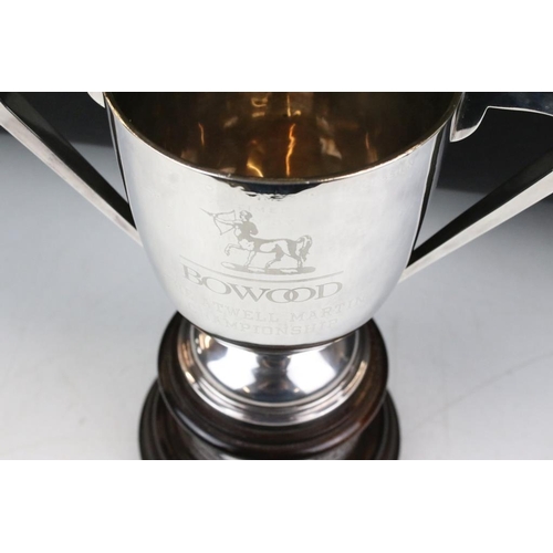 215 - A fully hallmarked sterling silver trophy, maker marked for Walker & Hall with a Sheffield assay mar... 