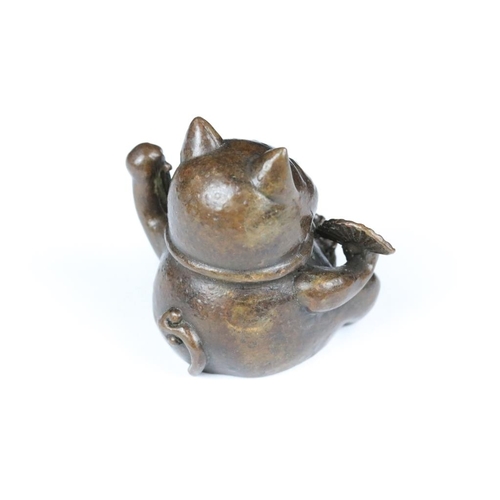 217 - An ornamental Japanese bronze 招き猫 / maneki-neko (waving / beckoning) lucky cat talisman.