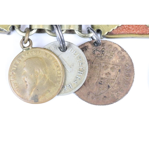 218 - A small group of mixed collectables to include two fancy link albert chains with yellow metal coins ... 