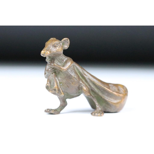 219 - An ornamental Solid bronze lucky fortune rat with bag.