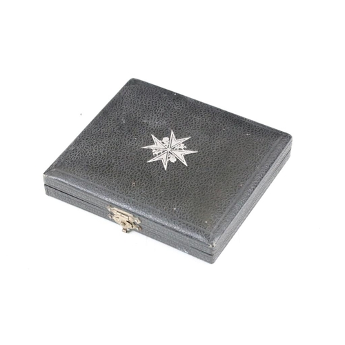 225 - A vintage cased St. Johns Ambulance medallion within black fitted case.