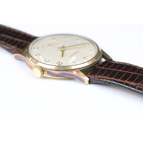 234 - A gents 9ct gold cased Garrards wristwatch presented by Rolls Royce in 1981.