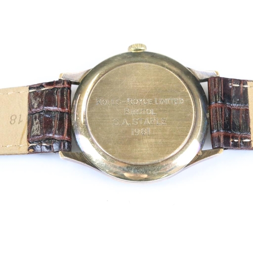 234 - A gents 9ct gold cased Garrards wristwatch presented by Rolls Royce in 1981.