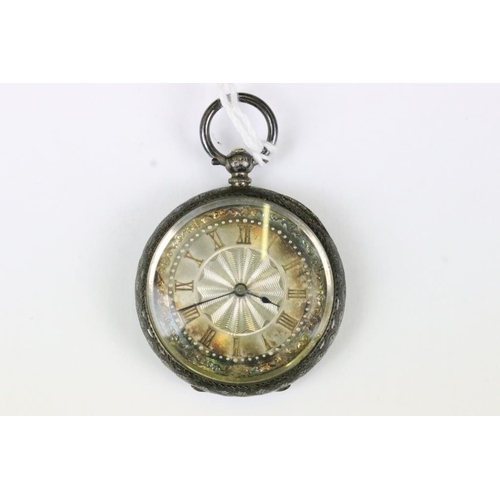 244 - A silver cased ladies fob watch with silvered dial, complete with key.