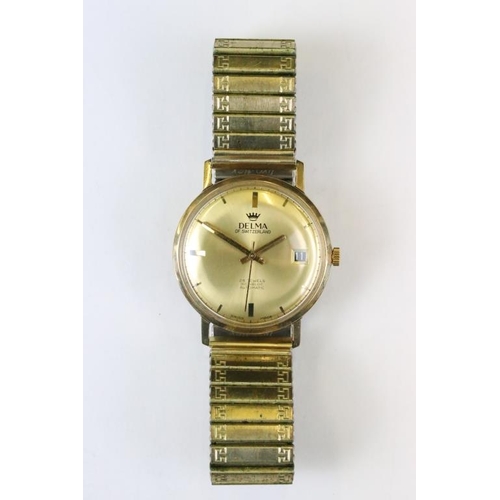 268A - A vintage gents 9ct gold cased Delma 25 jewel wristwatch with date function to 3 o'clock.