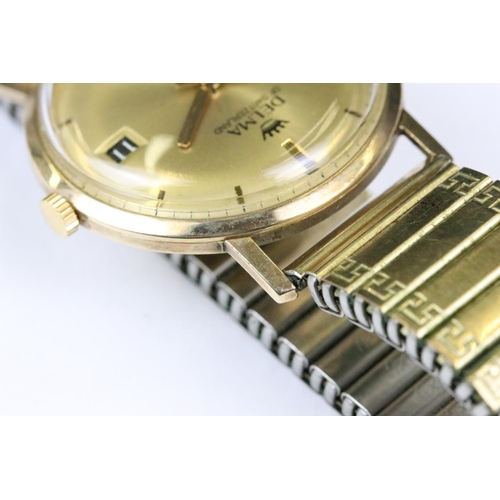 268A - A vintage gents 9ct gold cased Delma 25 jewel wristwatch with date function to 3 o'clock.