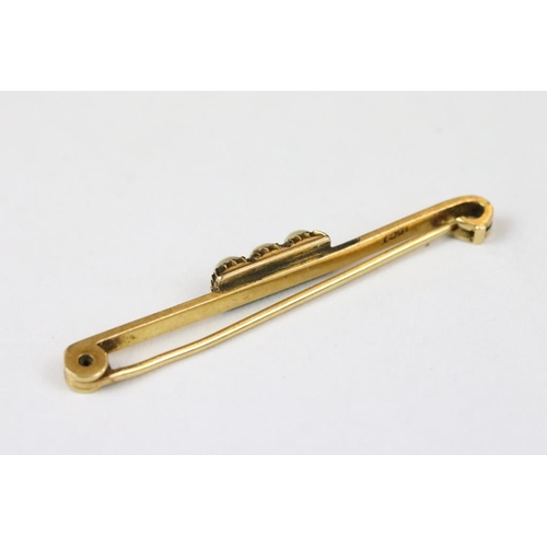 279 - A vintage 18ct yellow gold and seed pearl bar brooch.