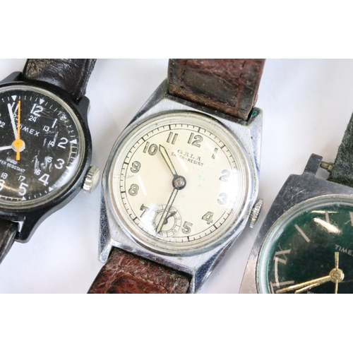 297 - A collection of mixed watches to include Ingersoll and Timex examples.