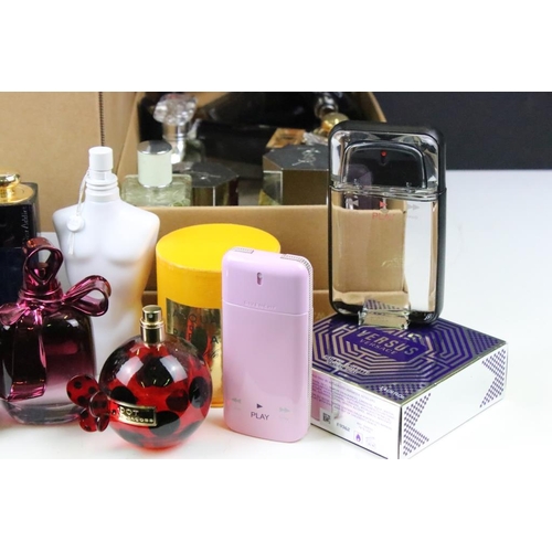 321 - A collection of perfume and scent dummy display bottles to include Yves Saint Laurent, Prada, Jean P... 