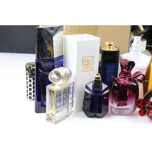 321 - A collection of perfume and scent dummy display bottles to include Yves Saint Laurent, Prada, Jean P... 