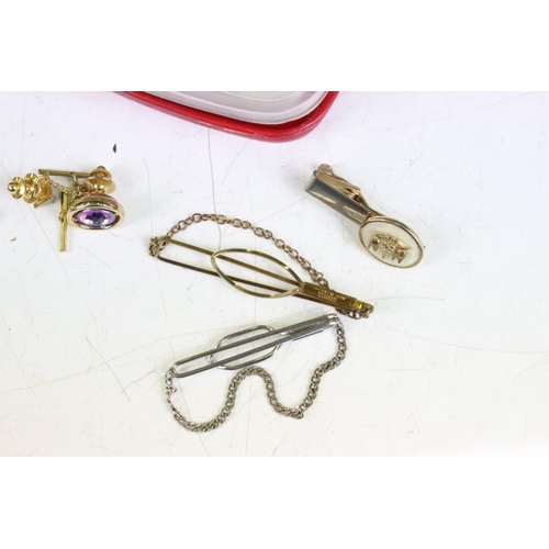 342 - A collection of vintage tie clips and cufflinks to include Kremets examples.