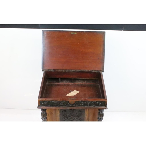 552 - Victorian Davenport, the over-structure with hinged lid opening to a stationery compartment, the hin... 