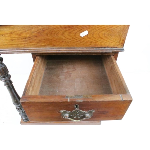 552 - Victorian Davenport, the over-structure with hinged lid opening to a stationery compartment, the hin... 