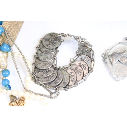 348 - A collection of mainly vintage costume jewellery contained within two boxes to include silver and an... 