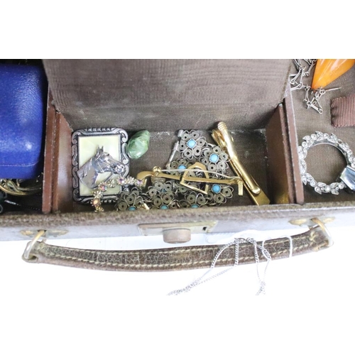 348 - A collection of mainly vintage costume jewellery contained within two boxes to include silver and an... 