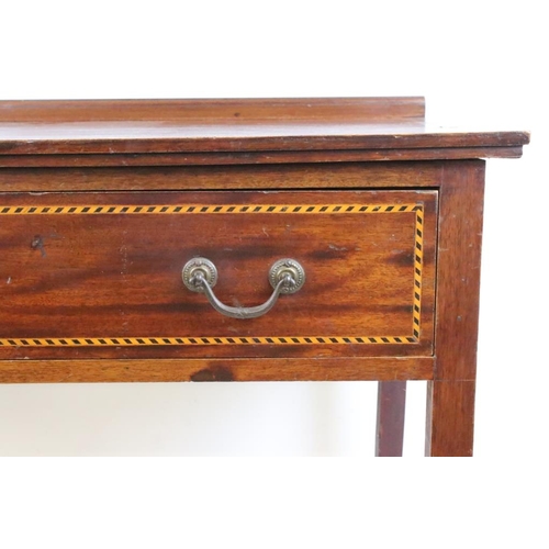 554 - Edwardian Mahogany Inlaid Side Table with single long drawer, raised on square tapering legs with ca... 