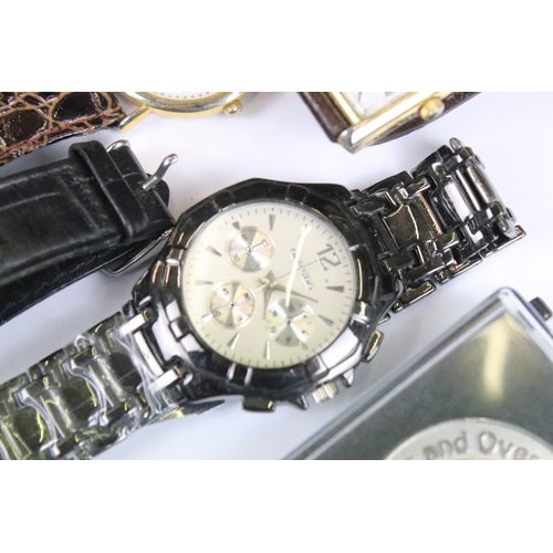 349 - A small selection of gents wristwatches to include Lorus.