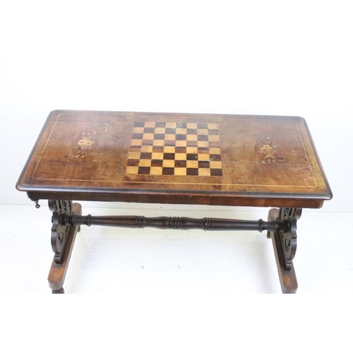 556 - Victorian Walnut Side / Games Table, the top with marquetry chess board inlay, raised on two shaped ... 