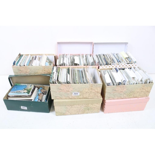 384 - Extensive collection of late 20th century postcards contained within 13 boxes / albums, covering a r... 