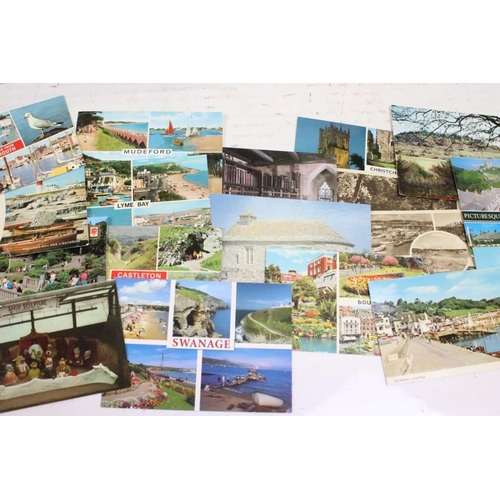 384 - Extensive collection of late 20th century postcards contained within 13 boxes / albums, covering a r... 