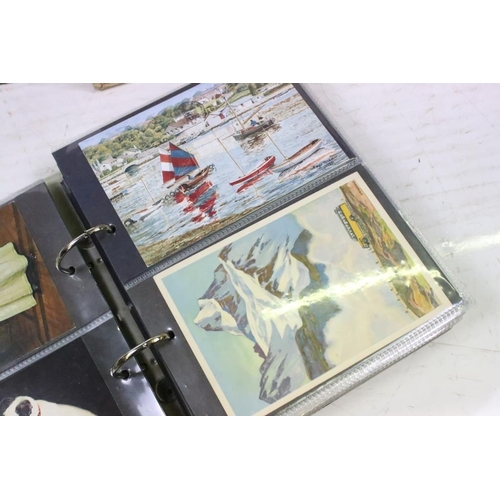 384 - Extensive collection of late 20th century postcards contained within 13 boxes / albums, covering a r... 