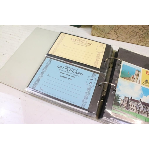 384 - Extensive collection of late 20th century postcards contained within 13 boxes / albums, covering a r... 