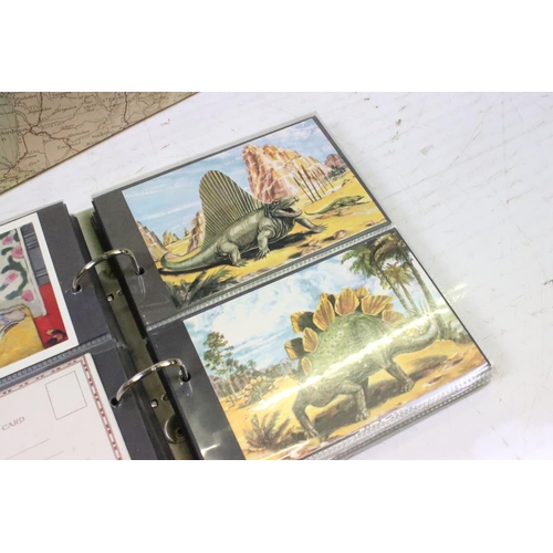 384 - Extensive collection of late 20th century postcards contained within 13 boxes / albums, covering a r... 