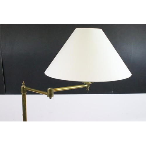 589 - Edwardian Mahogany and Brass Reading / Library Lamp with articulated lamp arm, the central mahogany ... 