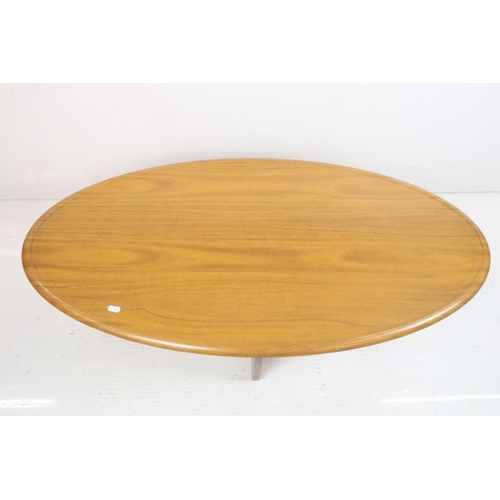 591 - Mid century Retro ' Formwood ' Oval Coffee Table with cross-over supports, label to underside, 111cm... 