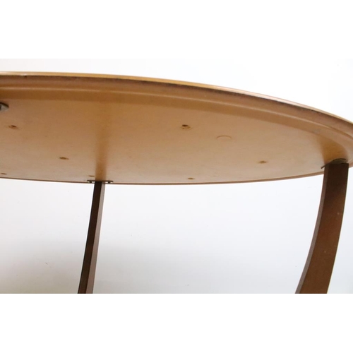 591 - Mid century Retro ' Formwood ' Oval Coffee Table with cross-over supports, label to underside, 111cm... 