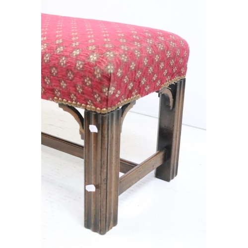 594 - Long Stool in the George III manner with upholstered seat and raised on square reeded legs with cros... 