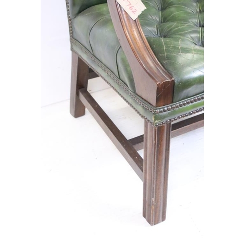 602 - Green Leather Button Back Elbow Chair in the George III manner, 63cm wide x 61cm deep x 94cm high