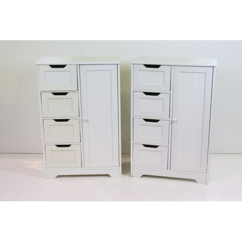 609 - Pair of White Cabinets, each with four short drawers and a cupboard door, each 56cm wide x 30cm deep... 