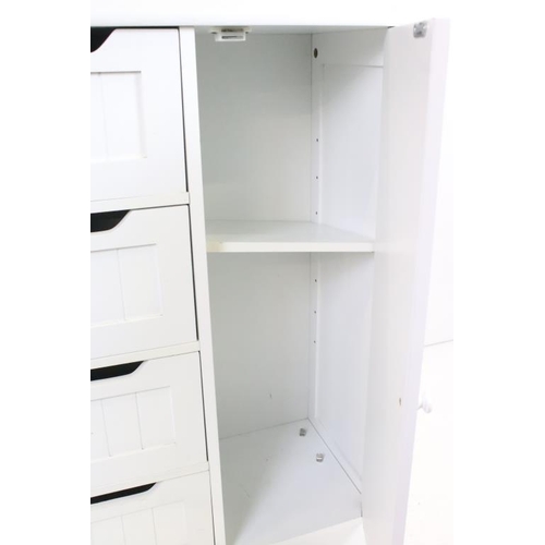 609 - Pair of White Cabinets, each with four short drawers and a cupboard door, each 56cm wide x 30cm deep... 