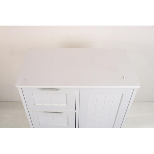 609 - Pair of White Cabinets, each with four short drawers and a cupboard door, each 56cm wide x 30cm deep... 