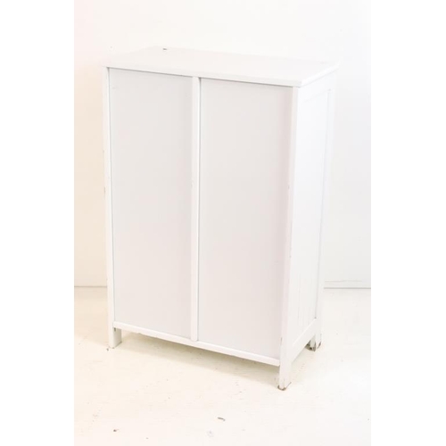 609 - Pair of White Cabinets, each with four short drawers and a cupboard door, each 56cm wide x 30cm deep... 