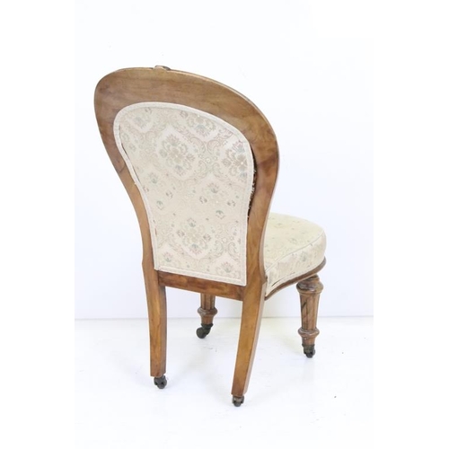 613 - Victorian Walnut Framed Spoon Back Upholstered Nursing Chair, raised on turned front legs with casto... 