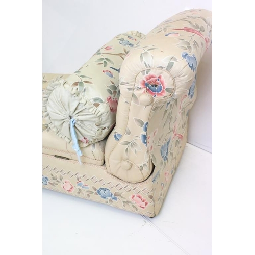 641 - Early 20th century Ottoman Daybed upholstered in cream floral fabric with bolster cushion, raised on... 