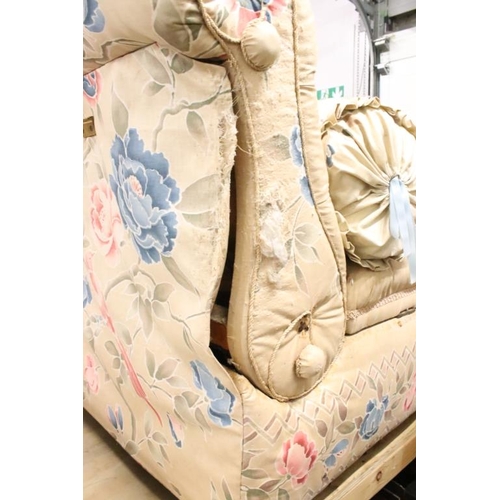 641 - Early 20th century Ottoman Daybed upholstered in cream floral fabric with bolster cushion, raised on... 