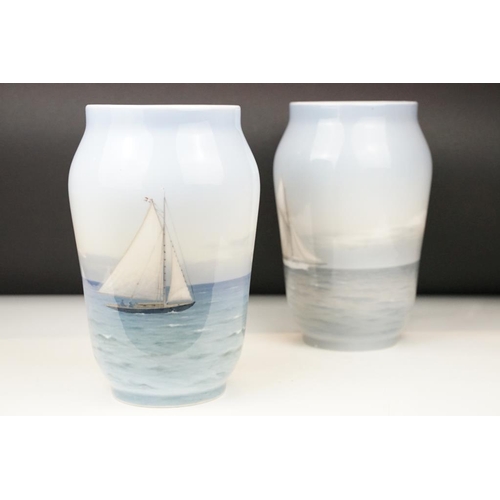 16 - Two Royal Copenhagen vases depicting sailing boats at sea, to include pattern numbers 1495/1217 and ... 