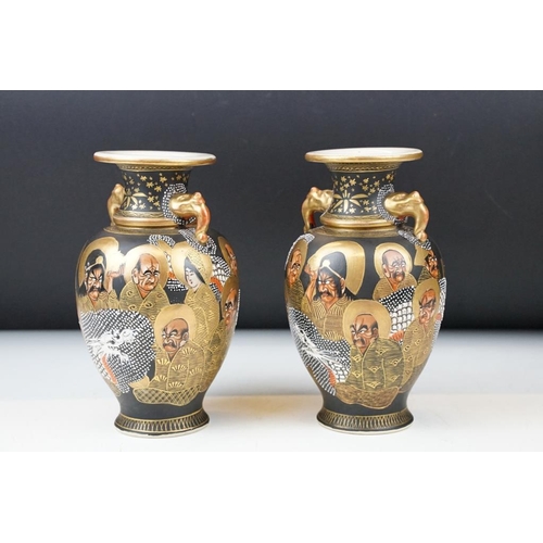 2 - Pair of early 20th century Japanese Satsuma ' Thousand Faces ' vases, of baluster form, twin-handed,... 