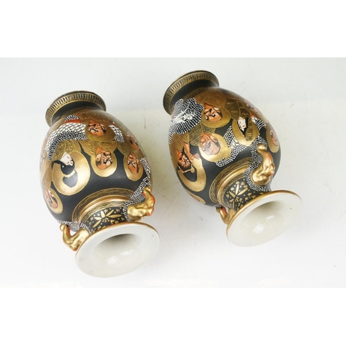 2 - Pair of early 20th century Japanese Satsuma ' Thousand Faces ' vases, of baluster form, twin-handed,... 