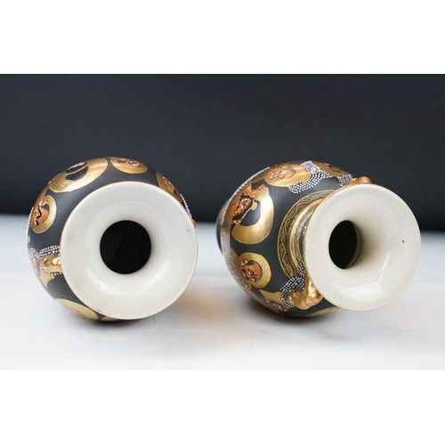 2 - Pair of early 20th century Japanese Satsuma ' Thousand Faces ' vases, of baluster form, twin-handed,... 