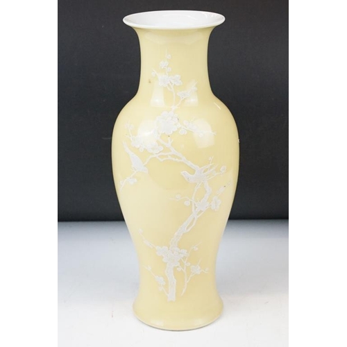 103 - Chinese Jingdezhen style yellow ground baluster vase, decorated with birds perched upon branches wit... 