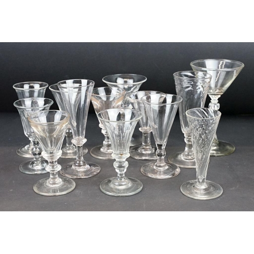 33 - Collection of 13 drinking glasses, mostly 19th century examples, featuring faceted examples with kno... 