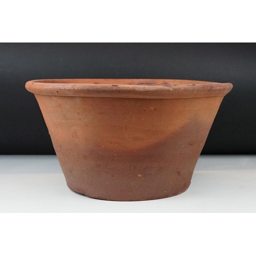 40 - Terracotta dairy / mixing bowl of typical conical form (38cm diameter), plus a large Lakes Pottery t... 