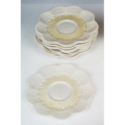 54 - Belleek Cream Cob Lustre tea ware, first and second period, to include 8 cups, 12 saucers, 3 milk ju... 