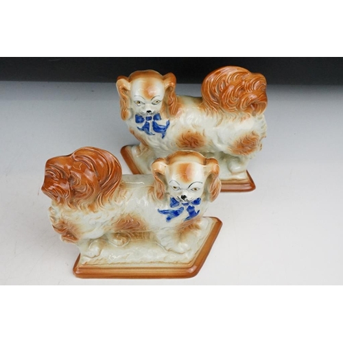 59 - Three pairs of Staffordshire ceramic dog figures, to include a pair of vases with gilt details (appr... 