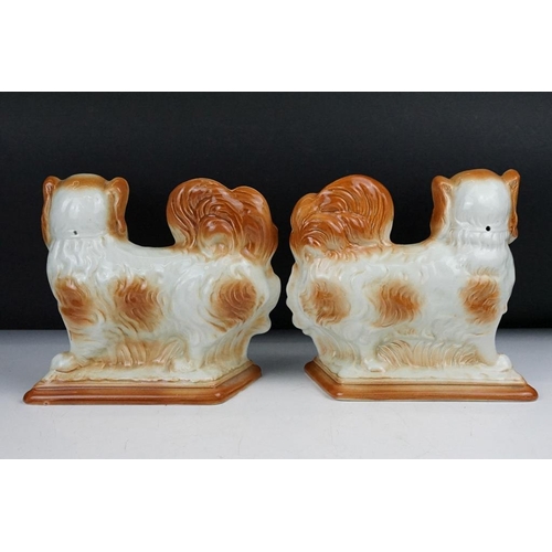 59 - Three pairs of Staffordshire ceramic dog figures, to include a pair of vases with gilt details (appr... 