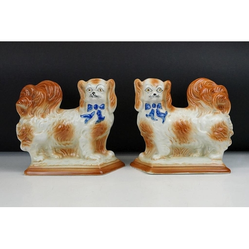 59 - Three pairs of Staffordshire ceramic dog figures, to include a pair of vases with gilt details (appr... 